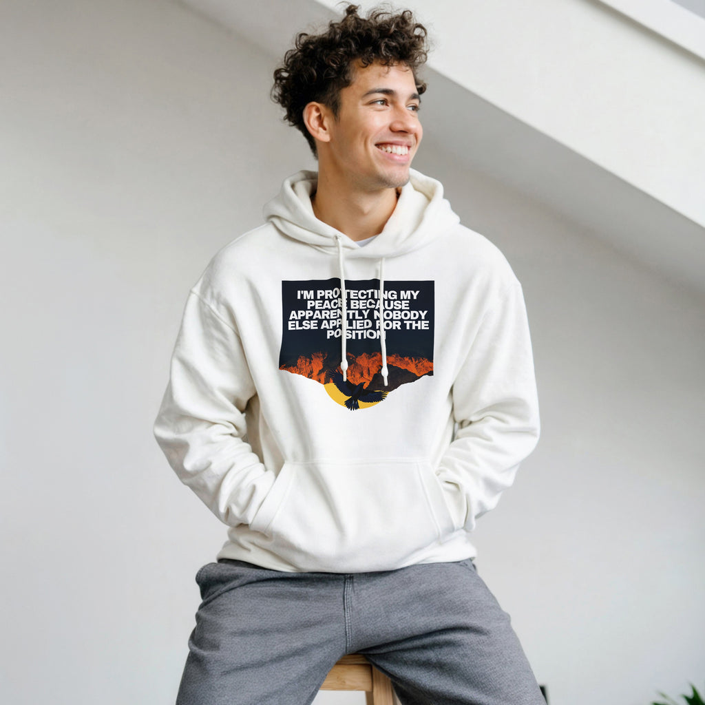 I AM PROTECTING MY PEACE BECAUSE APPARENTLY NOBODY ELSE APPLIED FOR THE POSITION” Unisex essential eco hoodie